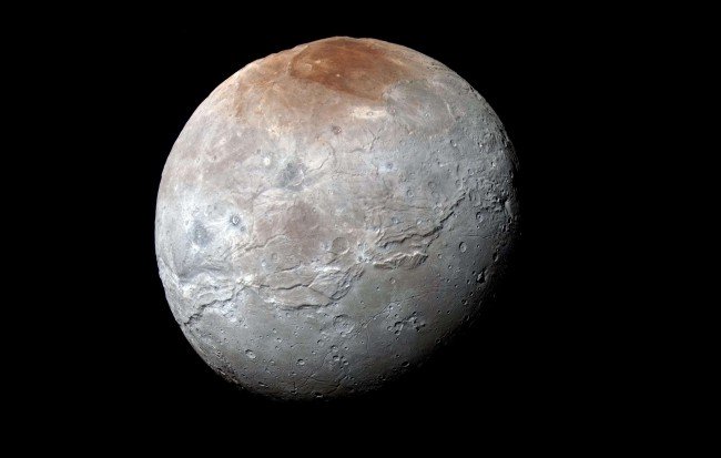 Возможно, спутник Плутона Харон разорвало изнутри (2 фото) - «Тайны Космоса»